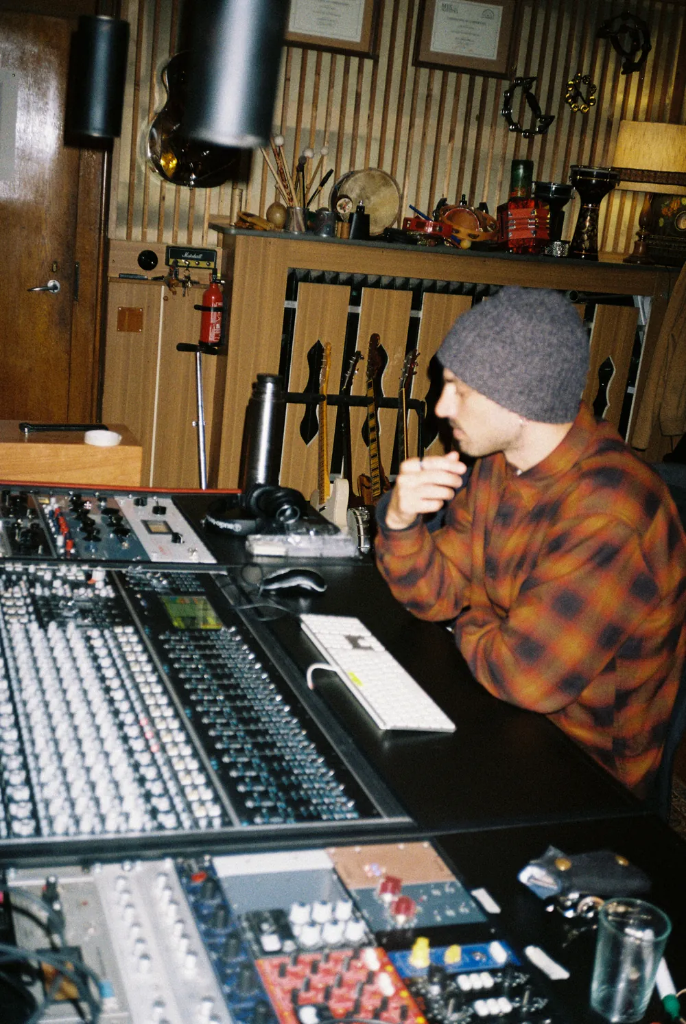 At the mixing console, Tricone Studios