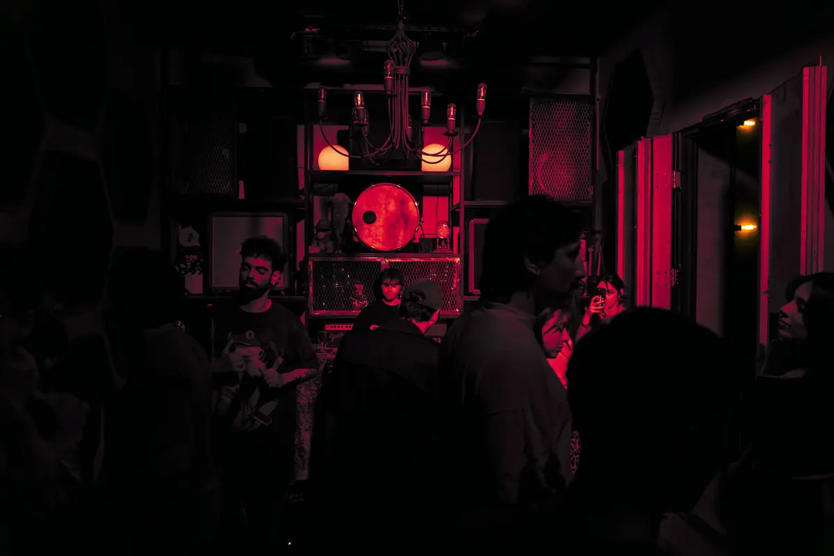 The room in red light during a set