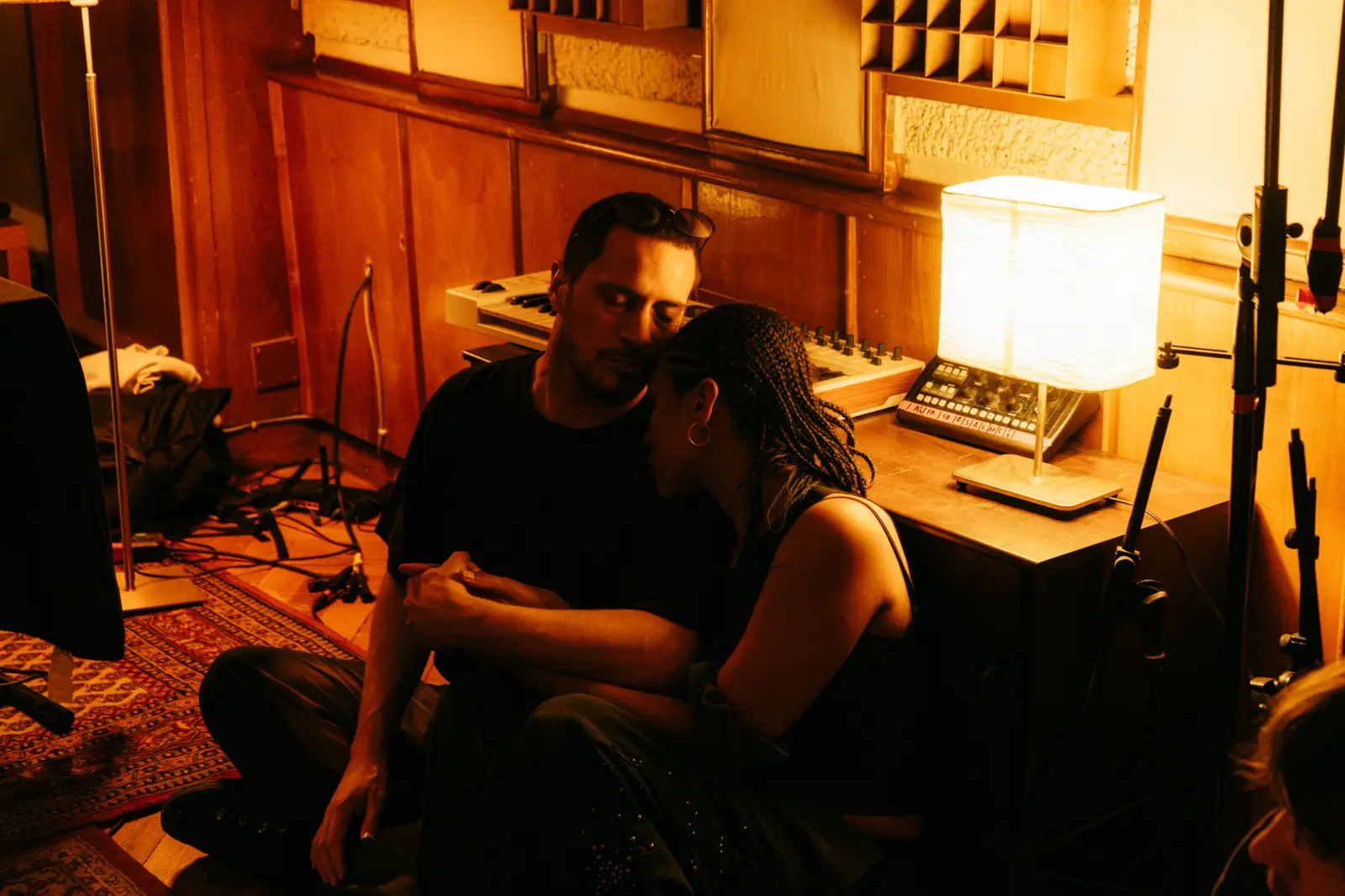 Two listeners embracing during the set